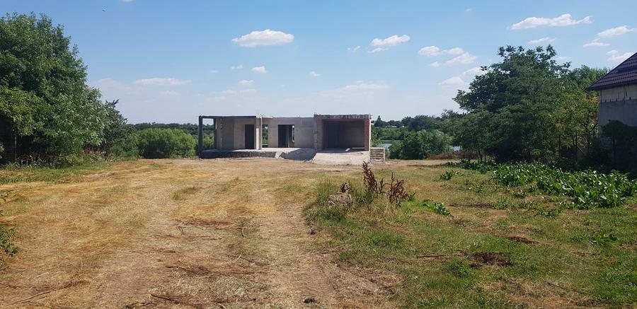 Proprietate frumoasa si rara cu deschidere la lac!La 30 km de Bucuresti