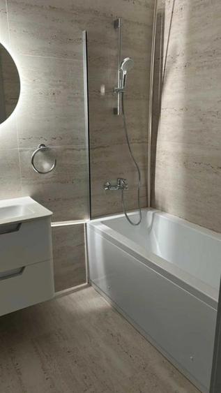 Apartament finisat cu parcare subterana in Elite City .