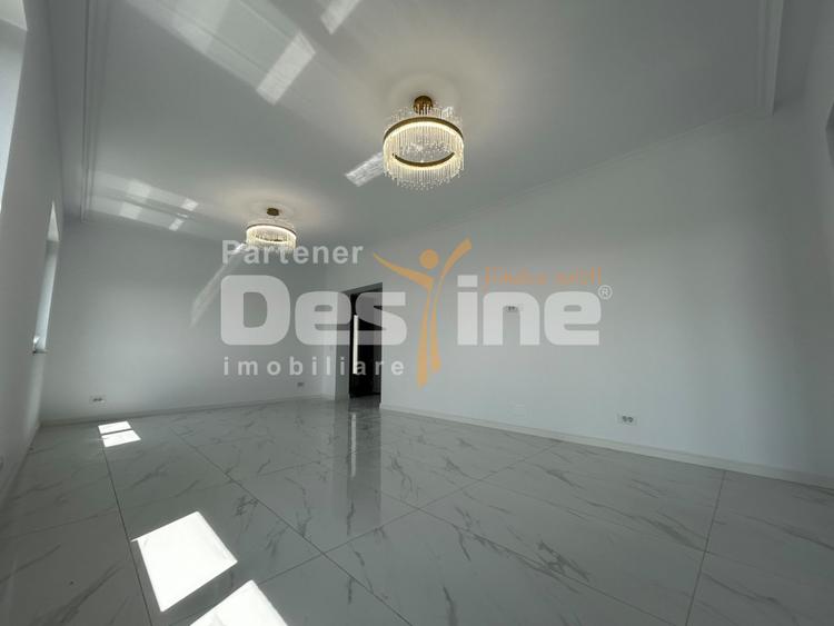 Casă individuală 4 camere, 100 mp utili, curte 400 mp, beci și 2 locuri parcare