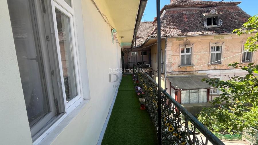 2 camere în inima orașului – ideal pentru locuit sau investiție - 6