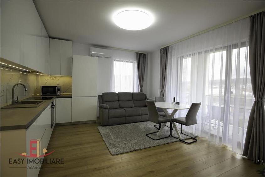 Apartament 3 camere, etaj 1, 70 mp, 1 parcare subterana, nou