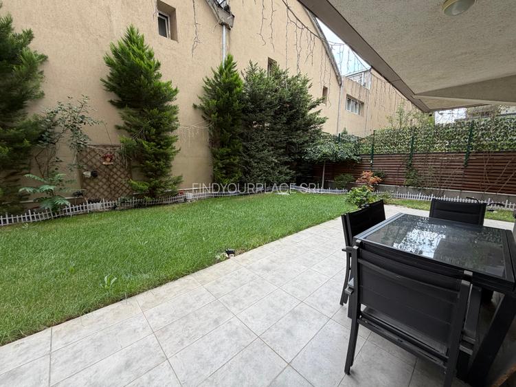 Apartament în Arcadia Domenii,230mp curte,3 parcări incluse