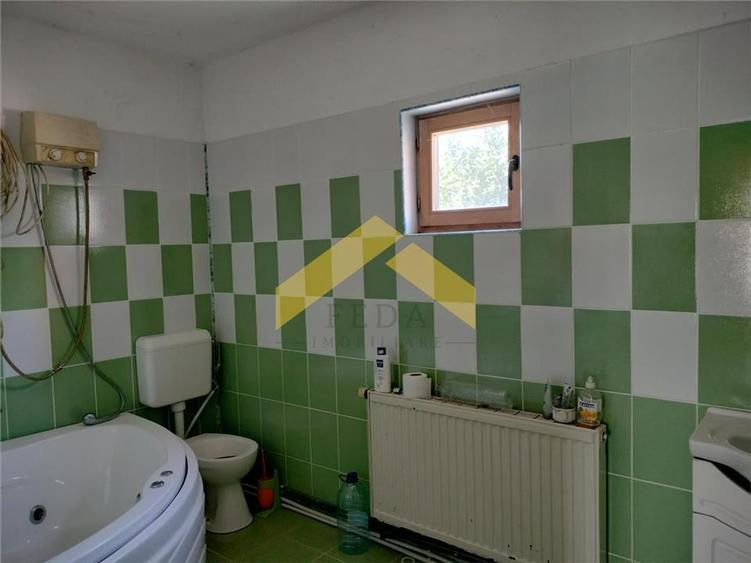 Casa la gri de vanzare in localitatea Fantanele