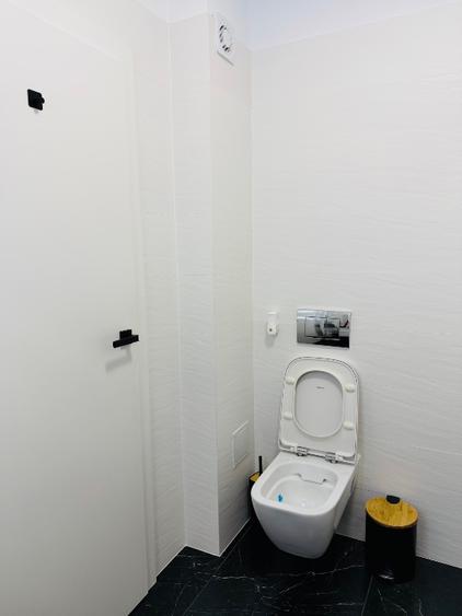 Apartament 2 camere + grădină proprie 70 mp + 2 locuri de parcare