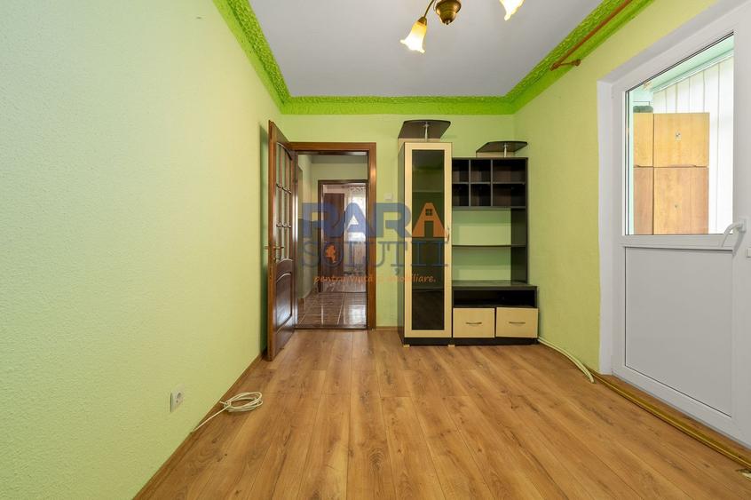 Apartament cu 3 camere, două băi, 77 mp