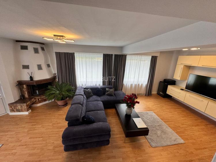 Casă modernă complet renovată, cu curte amenajată și sisteme inteligente
