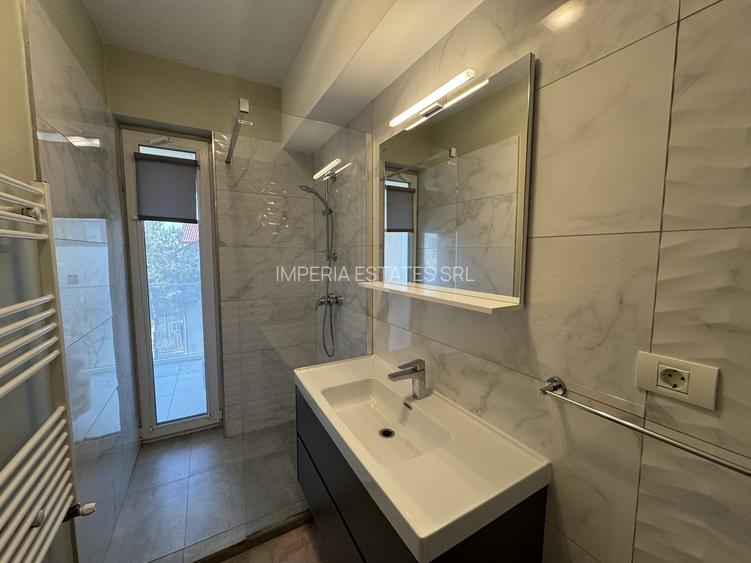 Apartament mobilat, terasa 33 mp, 2 dormitoare, garaj - 10