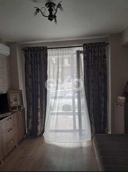 Apartament cu 3 camere de vânzare, curte proprie și terasă de 20 mp – Valea Lupu