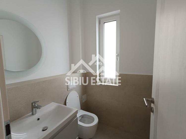 Apartament luminos, ideal locuință sau birou ,parter, 2 locuri parcare