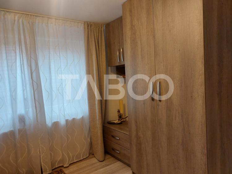 Casa in zona centrala 5 camere 2 bucatarii 3 bai curte comuna Cisnadie