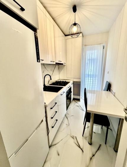 Apartament 1 camera - loc de parcare - mobilat utilat - liber