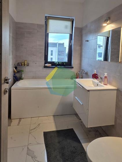 Casă tip duplex P+1+M, cu mansardă de 50 mp și curte generoasă