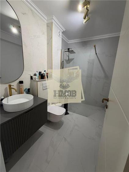 Apartament modern 2 camere balcon parcare subterană