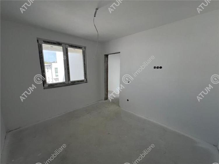 Casa cu 4 camere 2 bai curte de 50 mp zona Calea Cisnadiei Sibiu