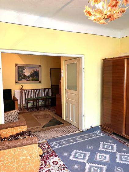 Casa  cu parau la limita proprietatii- zona submontana