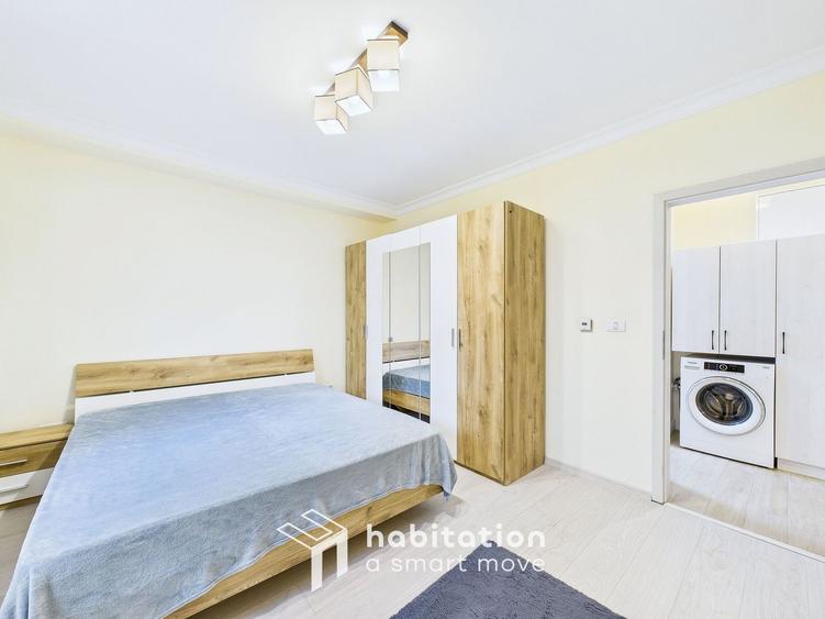 Apartament spațios cu curte și garaj – confortul unei case moderne