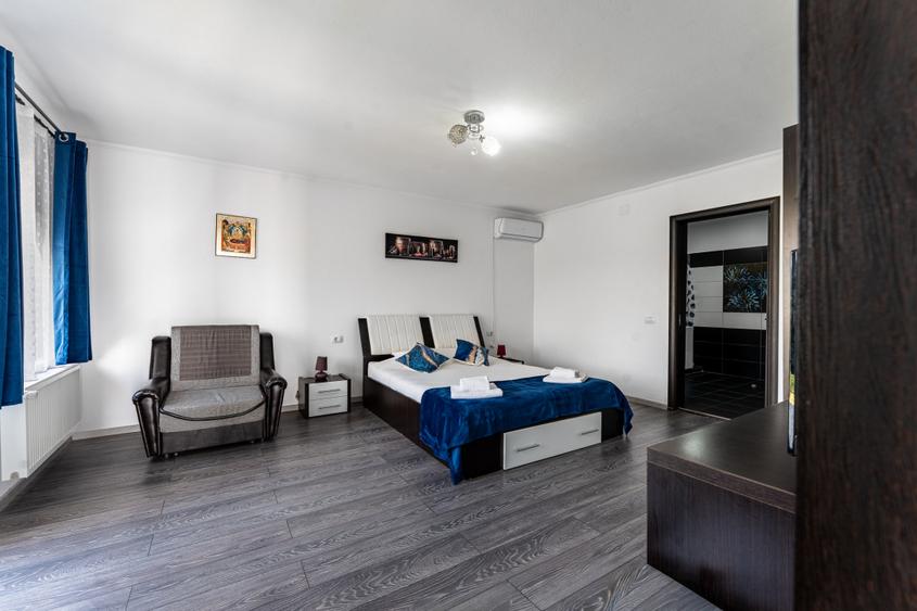 Com0%|Vilă turistică cu 8 camere + căsuțe A-frame, teren 5575 mp Călimănești, VL