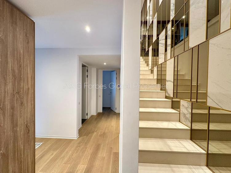 Duplex de lux cu terasă spectaculoasă, în inima zonei Charles de Gaulle