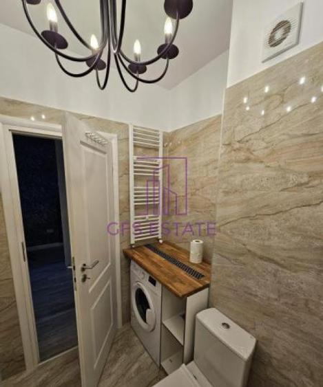 Inchiriere Garsoniera Central Address LUX