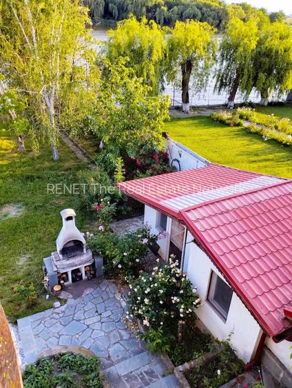 SUPER OCAZIE SE VINDE VILA DE LUX SI CASA DE OASPESTI IN BALOTESTI LA LAC 555000 - 36