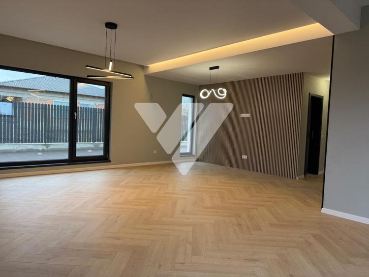 Apartament de lux 115 mp utili 4 camere 4 bai curte privata 200 mp