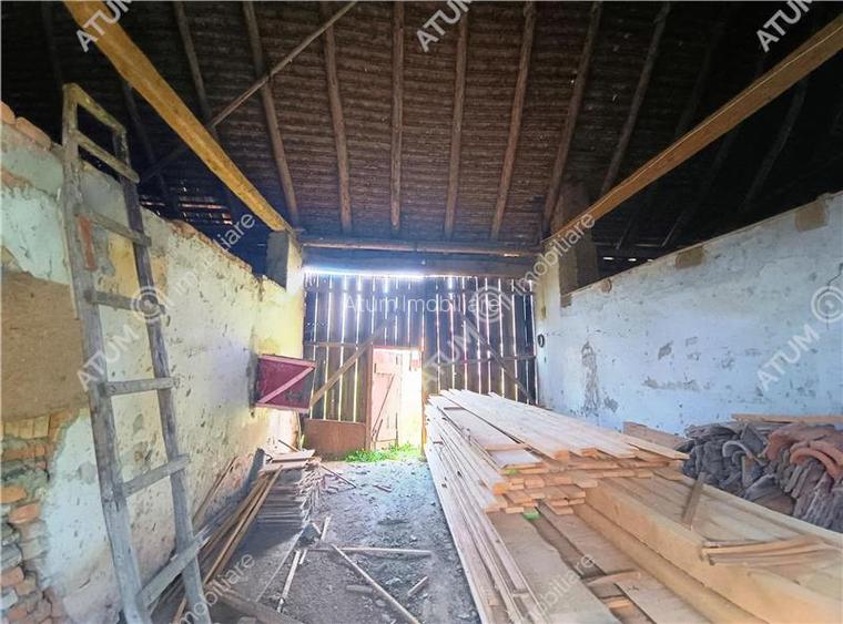 Casa cu 4 camere si 1650 mp teren la doar 30 km distanta de Sibiu - 33
