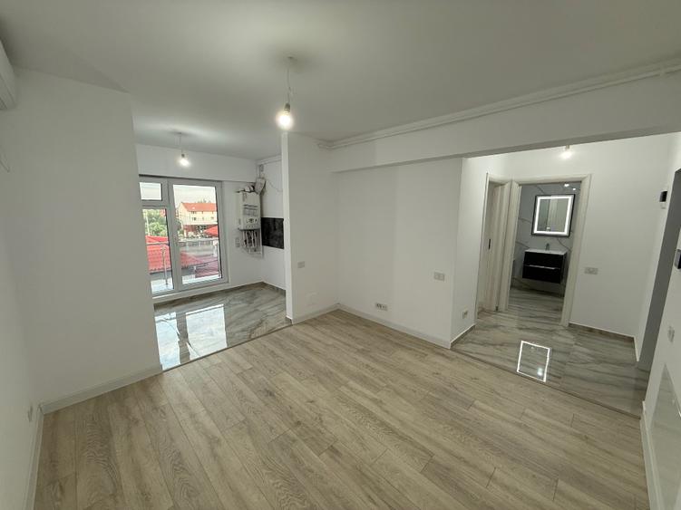 Apartament 2 camere tip studio + parcare