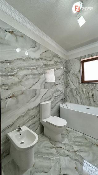 Casa individuala cu 4 camere, 130 mp utili - zona Ghiroda