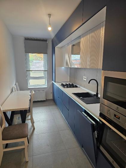 Vand apartament cu 2 camere,mobilat,utilat ,nelocuit,nou,parcare subterana