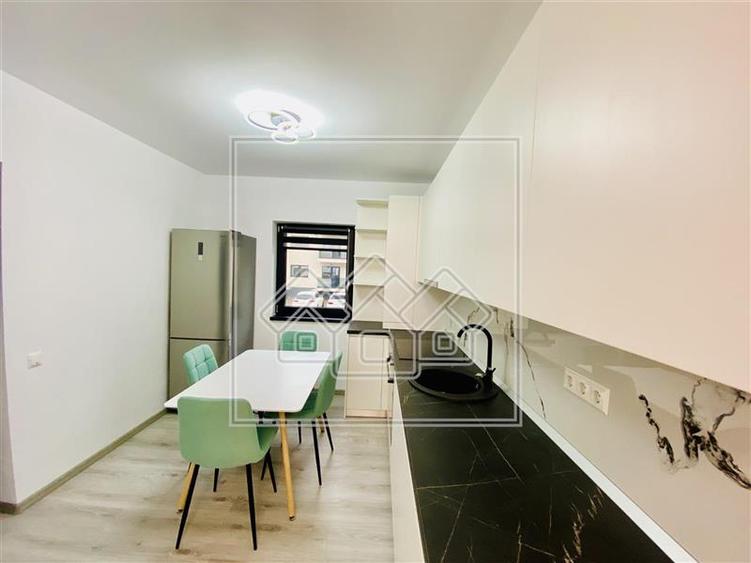 Ap. 2 camere si gradina, mobilat si utilat modern, zona D. Stanca