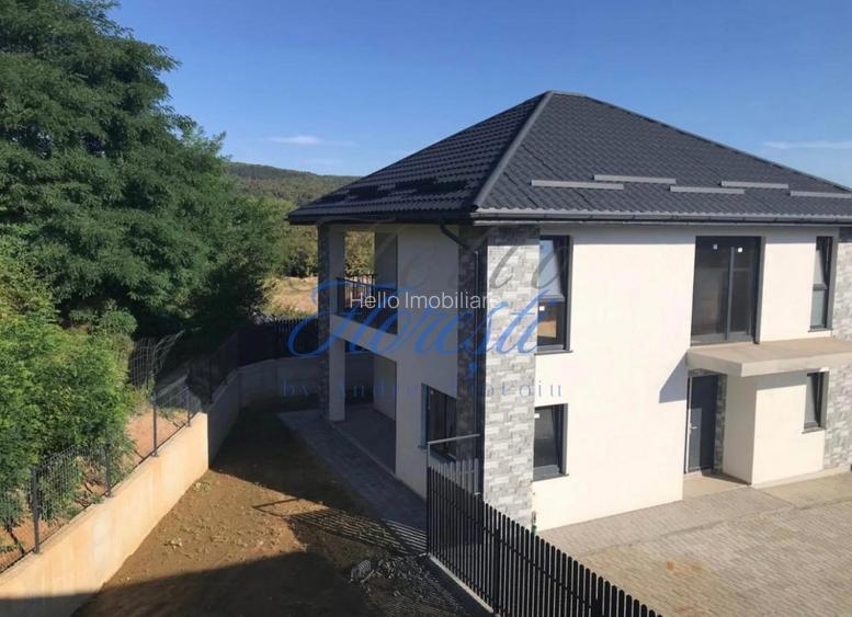 Casa individuala 130mp utili, 30mp terase, 400mp teren, 3 parcari, 4 camere