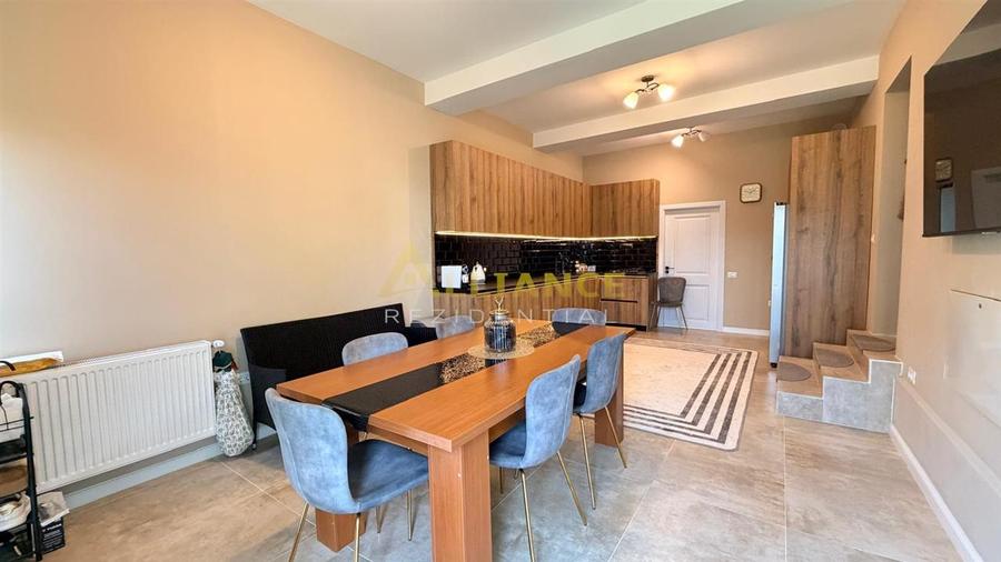 Vila spatioasa cu 9 camere, foisor, magazie, curte amenajata complet