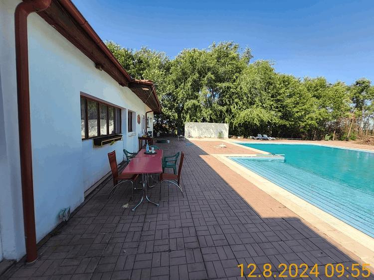 70 loturi drum in curs de asfaltare piscina utilitati partial amenajat