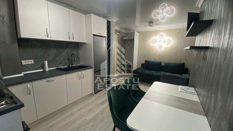 Apartament 2 camere, de închiriat,garaj,centrala proprie, zona Unirii