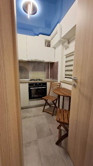 Garsoniera Lux - Amenajata cu stil, ofera confort si utilitate.