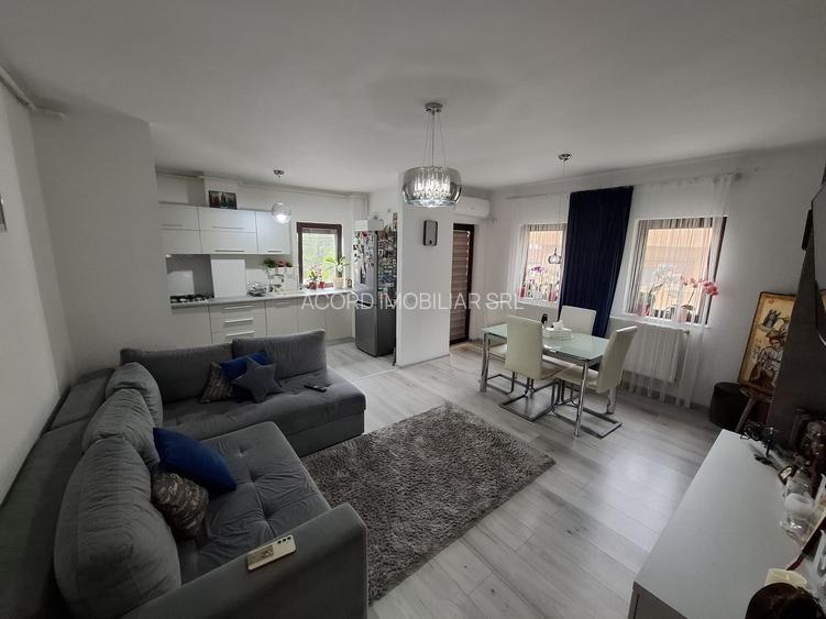Apartament cu trei camere și loc de parcare în bloc nou din cartierul Km4 - 2
