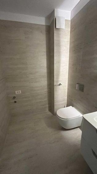Apartament finisat cu parcare subterana in Elite City .