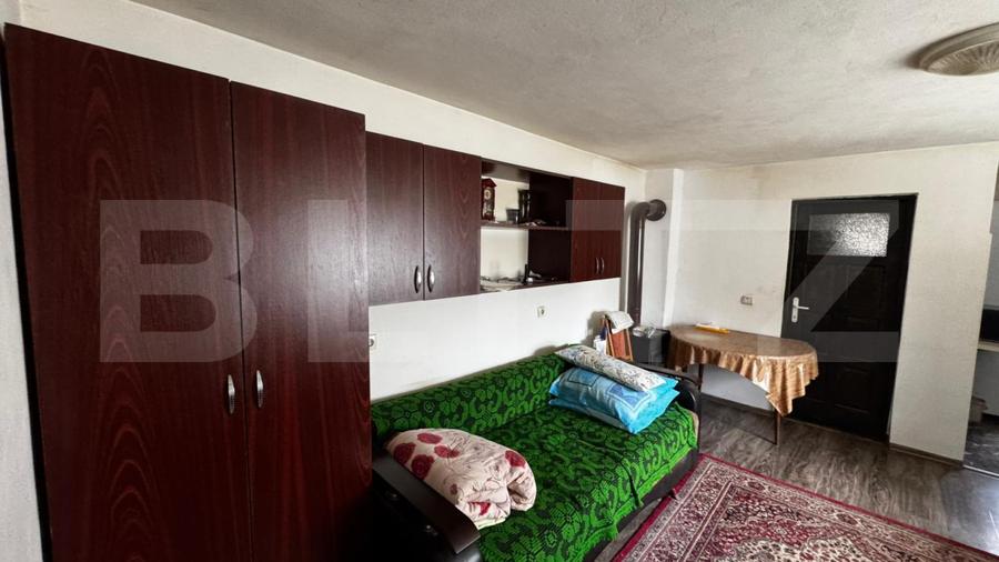Casă cu 3 camere, teren 1180 mp, în comuna Săsciori