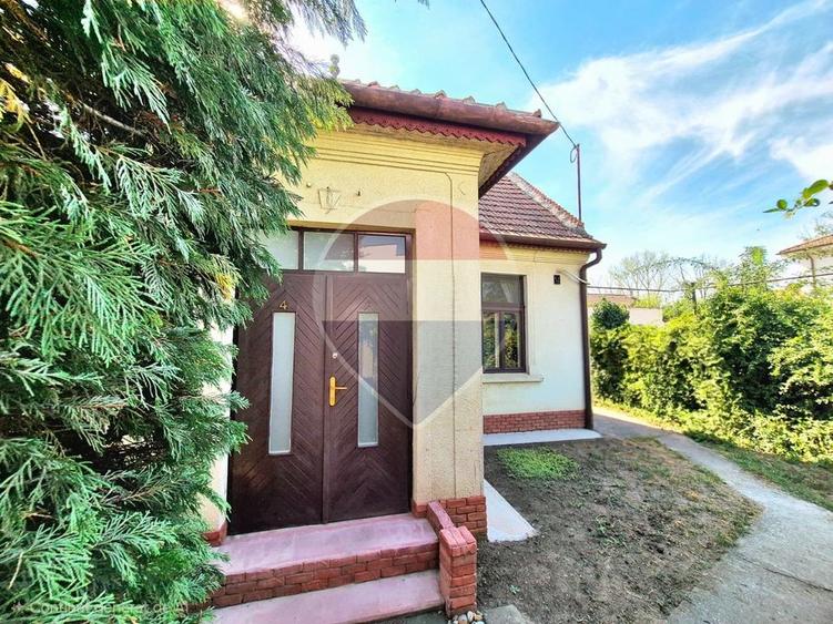 O casă cu aer boem, la câțiva pași de Mureș
