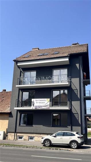 Apartament 3 camere bloc vila - 75 mp + parcare - Tractorul 137500 euro - 9