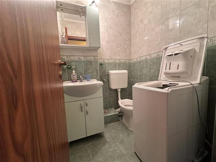 Decomandat cu 2 bai si 2 balcoane cu garaj sub bloc