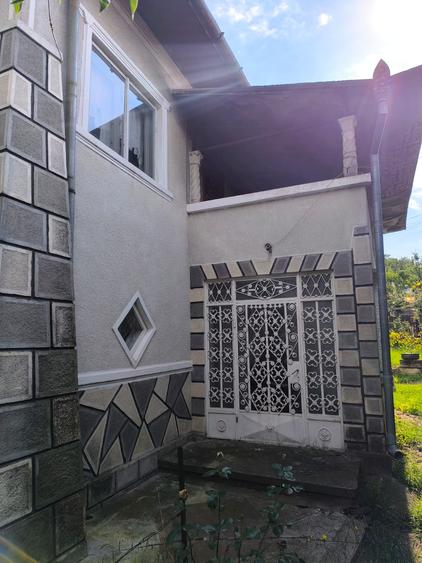 Casa spatioasa 8 camere+cladire auxiliara pretabil locuinta sau afacere+magazin