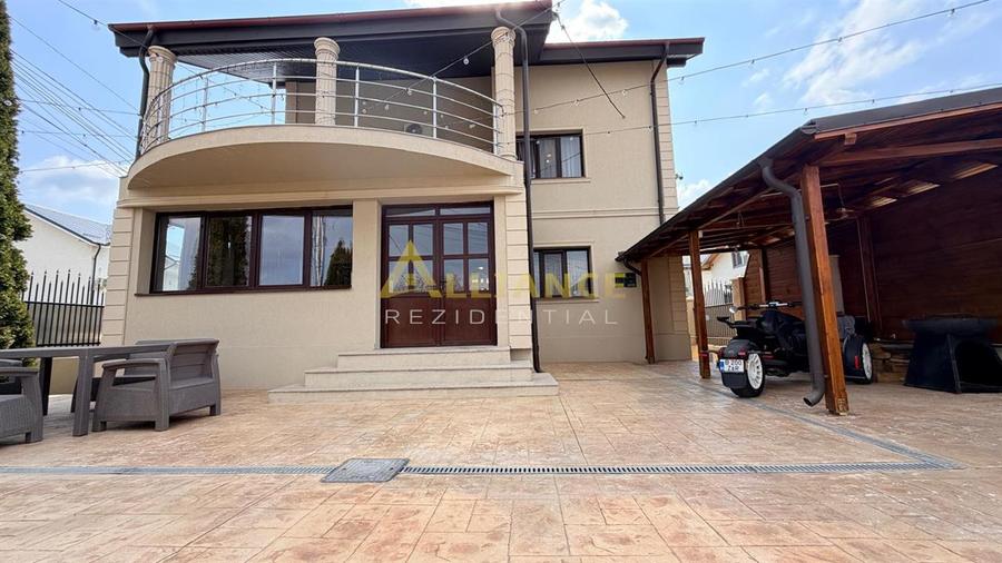 Vila spatioasa cu 9 camere, foisor, magazie, curte amenajata complet
