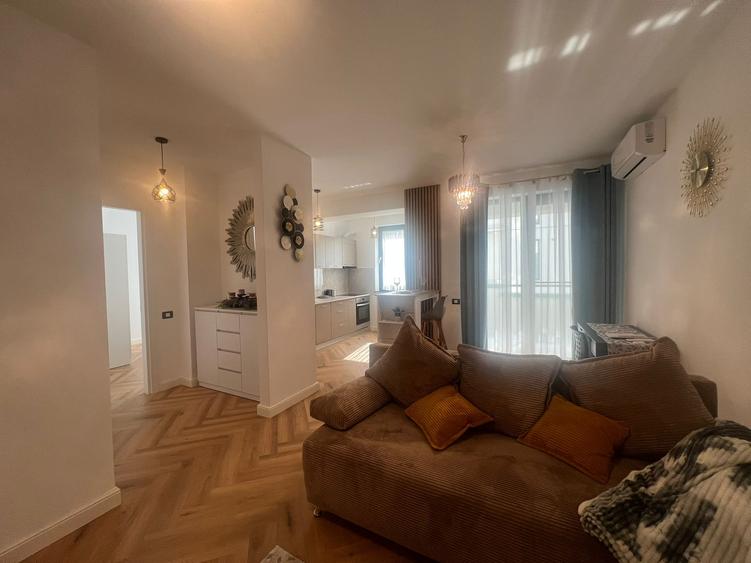 Apartament 2 camere mobilat si utilat cu loc de parcare inclus