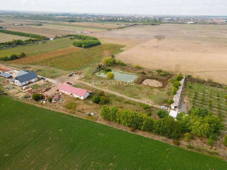 Casă cu teren 13 418 mp intravilan