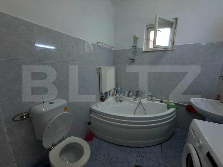 Casă spațioasă cu 2 corpuri , 300 mp– ideală pentru 2 familii – teren 776 mp