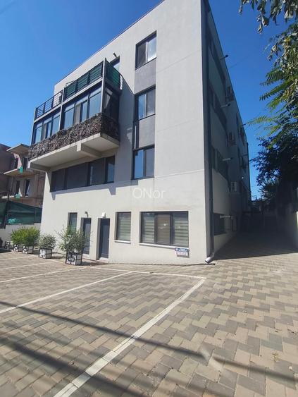 Apartament 2 dormitoare-living openspace, loc de parcare