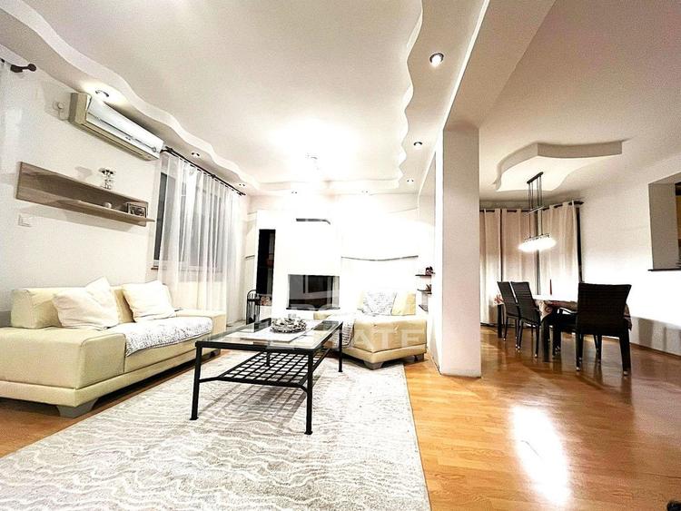Casa individuala cu 6 camere, 3 bai, garaj, teren 500 mp si 2 fronturi