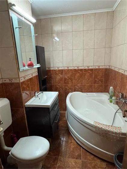Decomandat cu 2 bai si 2 balcoane cu garaj sub bloc
