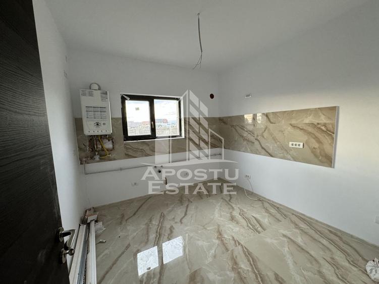 Duplex situat Central cu 4 camere si 3 bai in Mosnita Noua